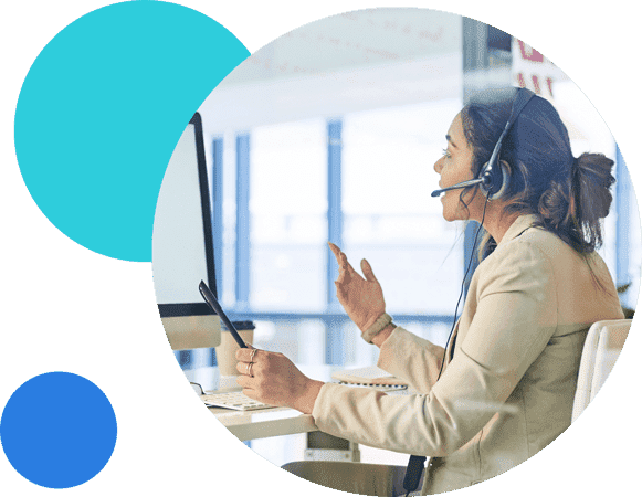 Businesswoman with headset conducting a virtual meeting at a desk.