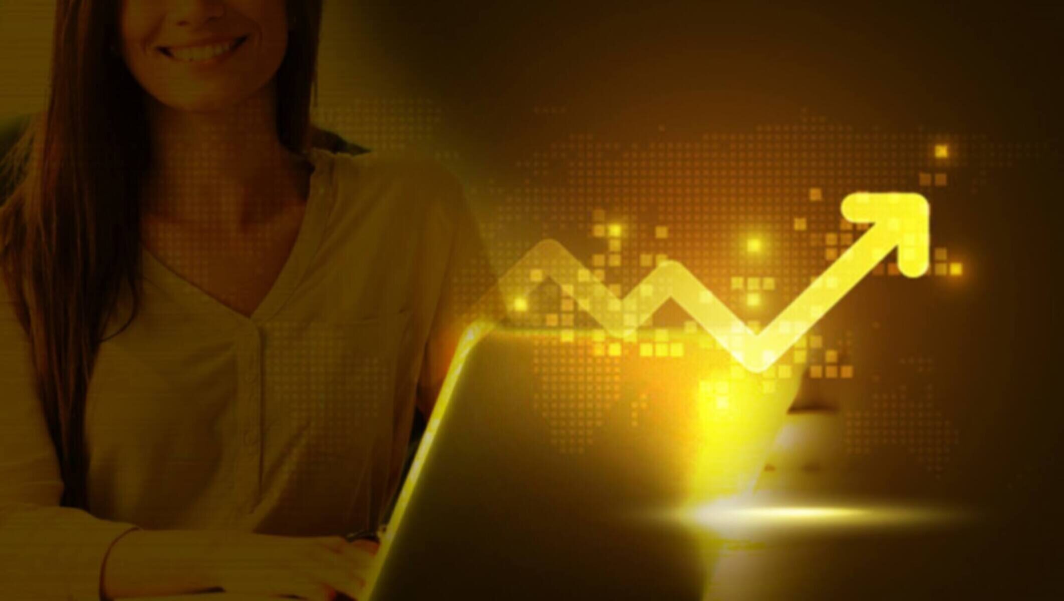 Smiling woman working on laptop with upward business growth graph.