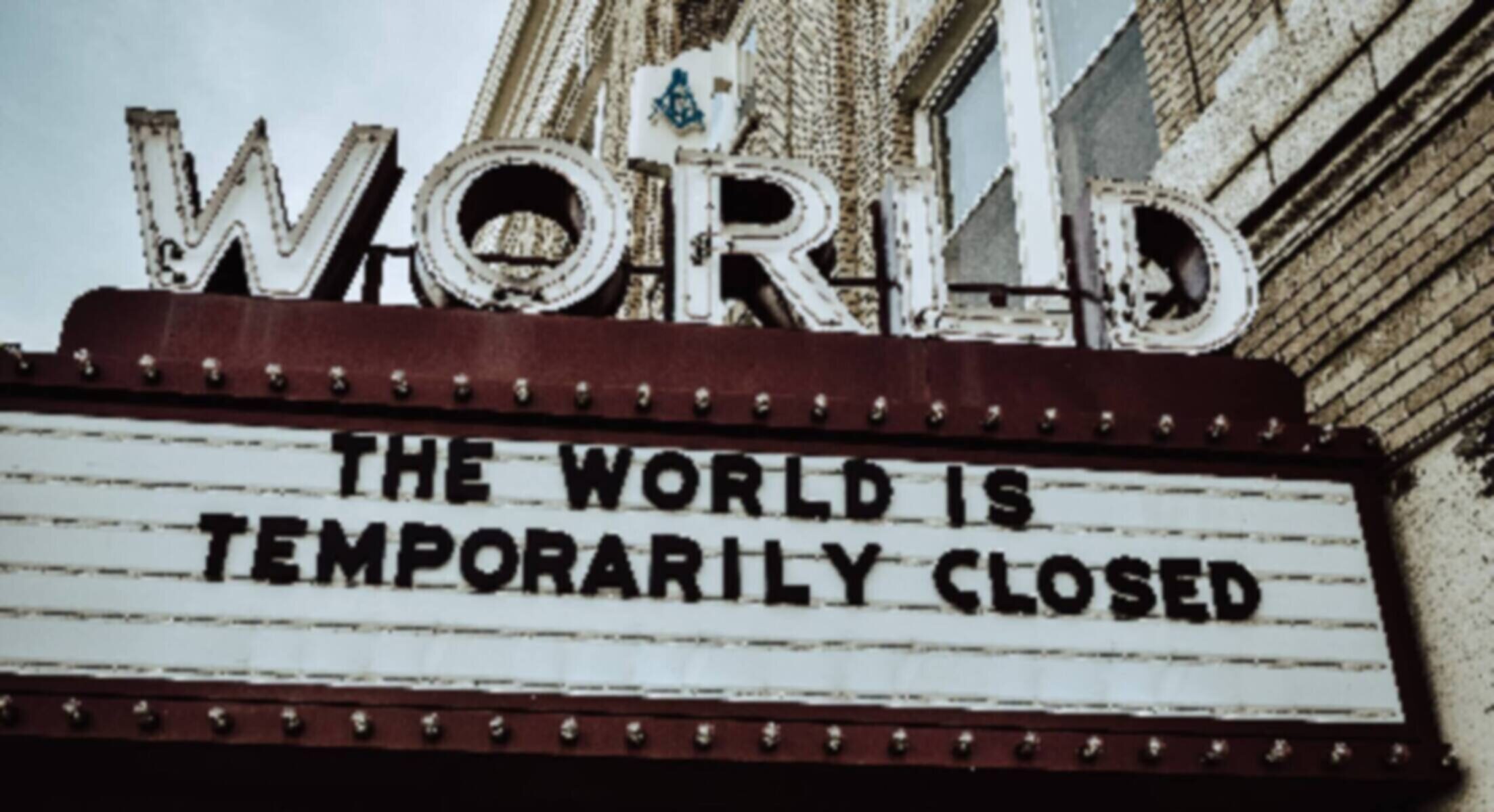 Marquee sign with message "The World is Temporarily Closed