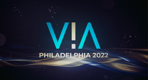 VIA Philadelphia 2022 logo with abstract background