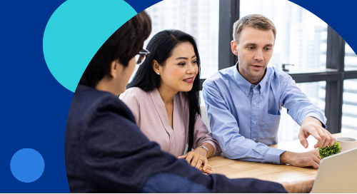 Group of professionals collaborating during a business meeting in a modern office.