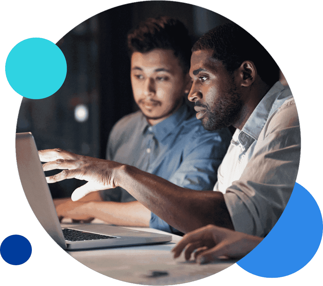 data-licensing-inset Two coworkers collaborating on a laptop in an office setting.