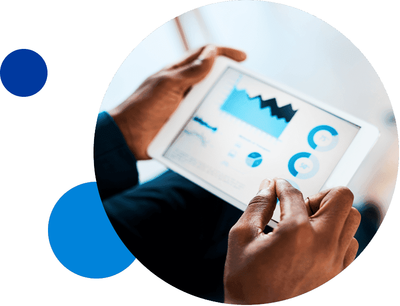 ConsumerFinance_MediaAdTech_databuilt Person analyzing business analytics on a tablet.