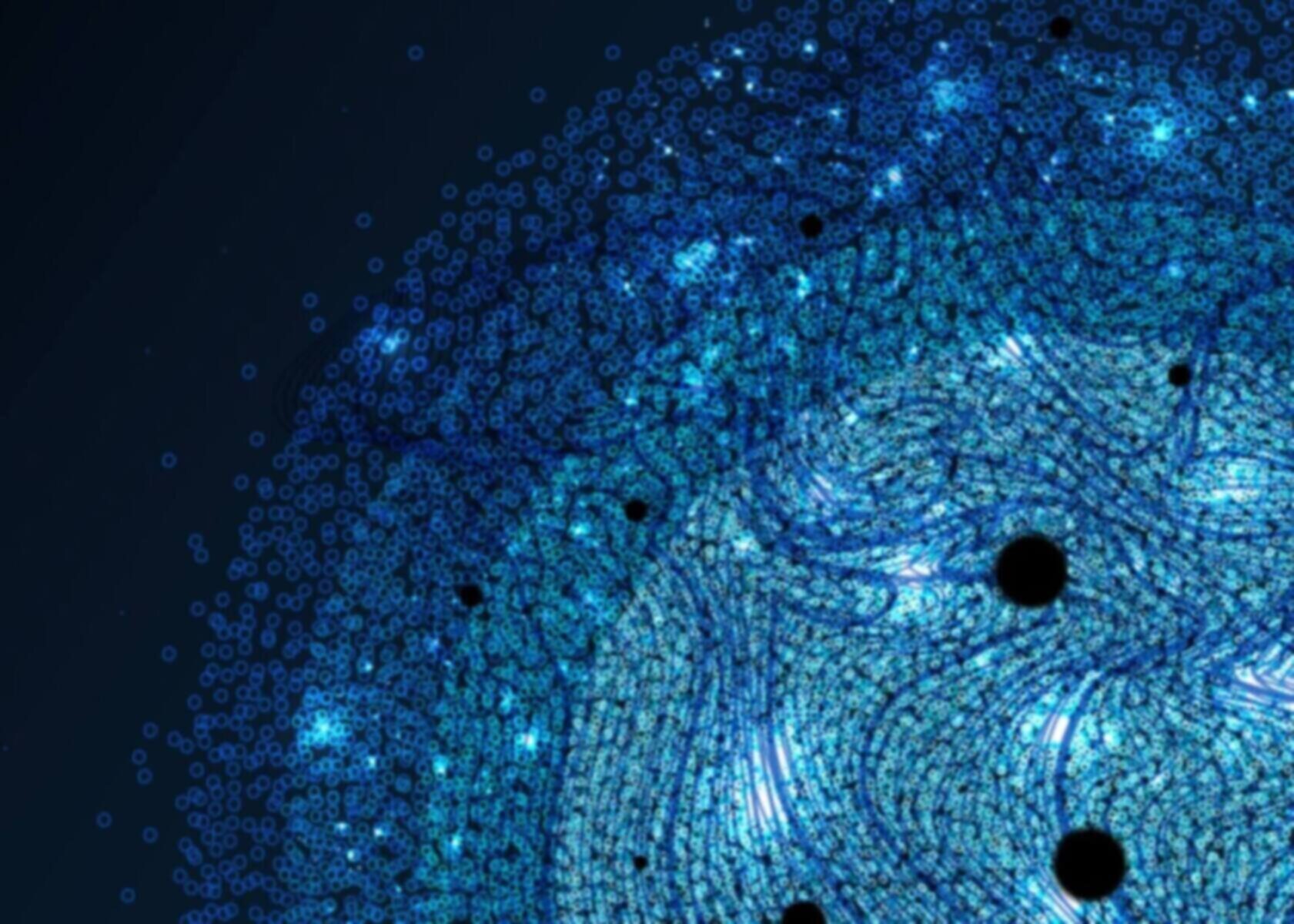 Blue swirling galaxy or microscopic view with intricate patterns