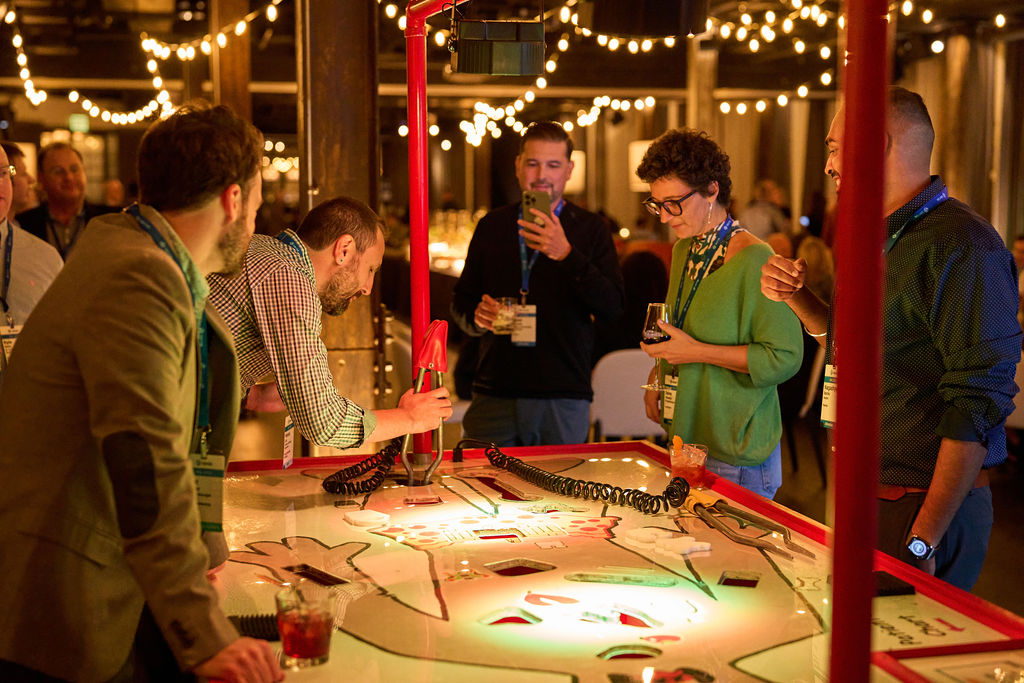 _P1_2968 People playing a large operation game at a social event.