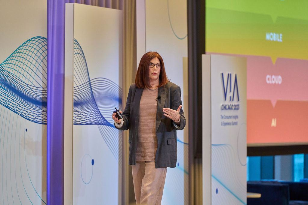 _P1_3362 Speaker presenting on AI and cloud technology at a business summit.