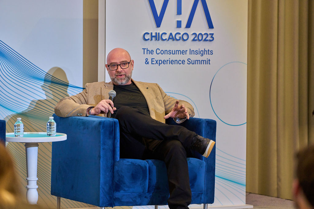 _P1_3696 Man speaking at VIA Chicago 2023 Consumer Insights & Experience Summit.
