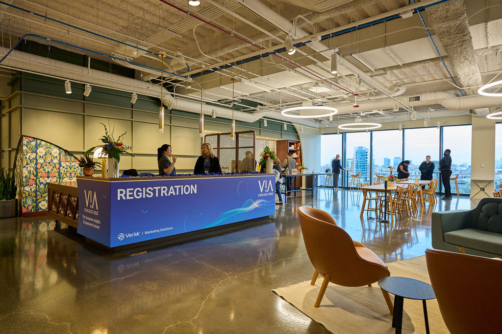 _P2_7925 Modern conference registration area with city views in the background.