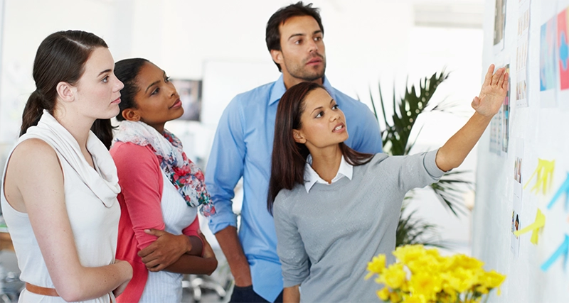 people planning omnichannel marketing campaigns that include direct mail